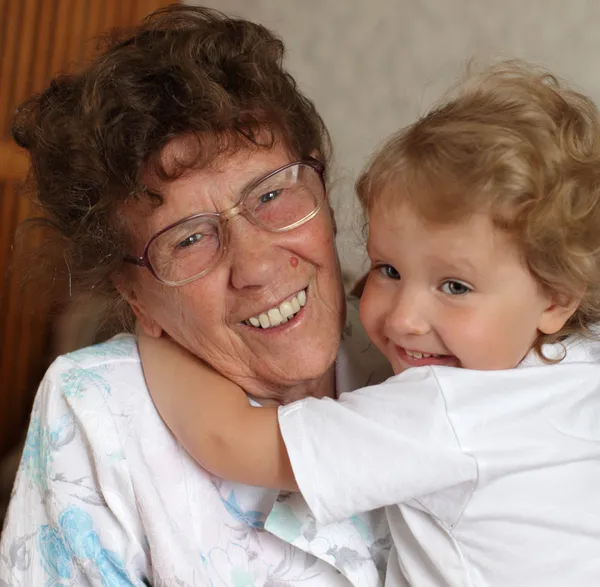 Happy prograndmother with granddaughter — Stock Photo, Image