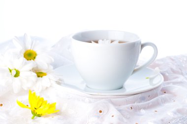 Flower tea with a camomile. clipart