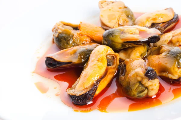 Mussels in red sauce — Stock Photo, Image
