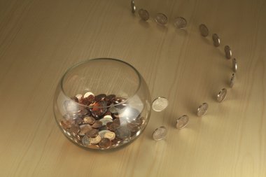 Coins going to bowl clipart