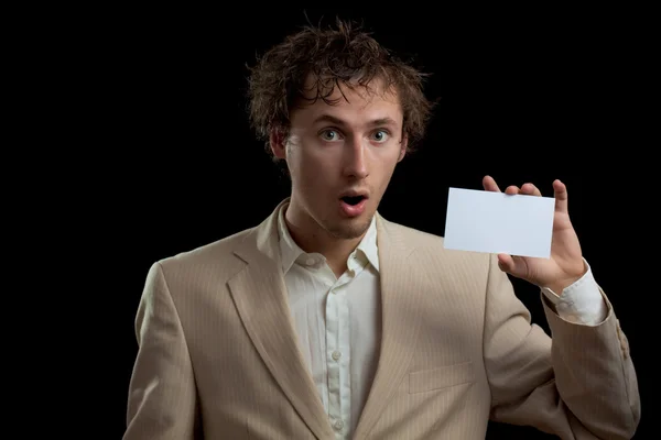 Hombre sosteniendo tarjeta en blanco — Foto de Stock