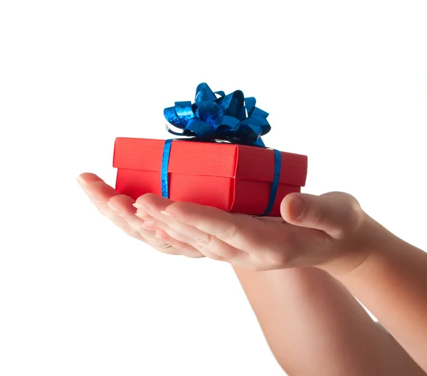 Hands giving a gift — Stock Photo, Image
