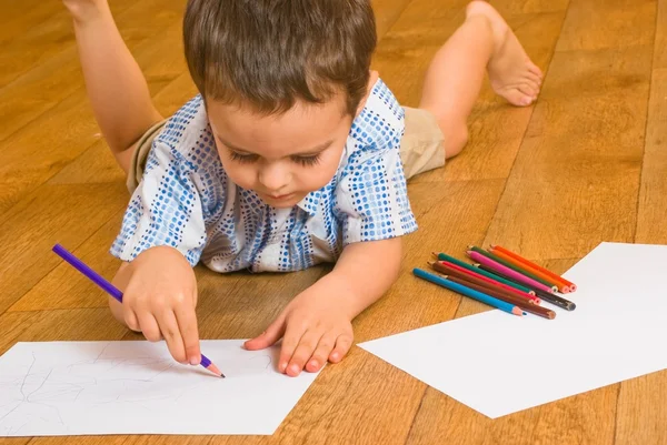 The boy draws pencils — Stock Photo, Image