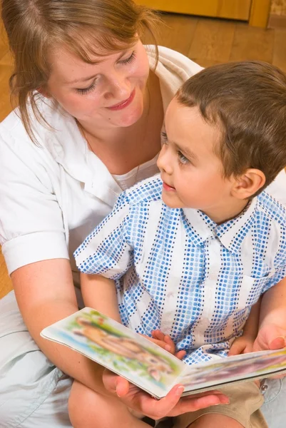 Mum and the son look the book — Stock Photo, Image