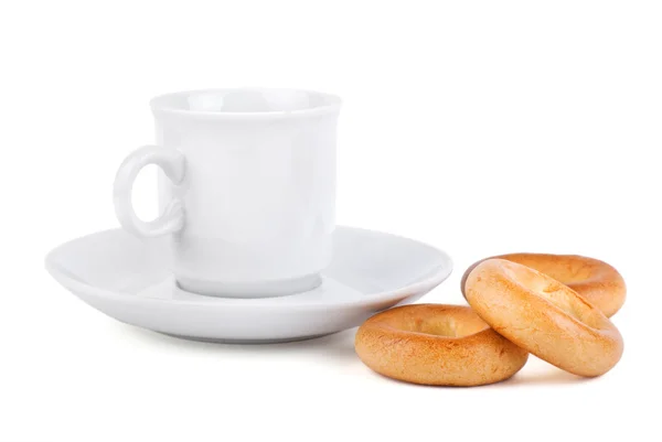 Stock image Cup on saucer with bagels