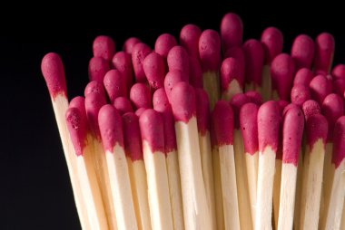 Matches on a black background clipart