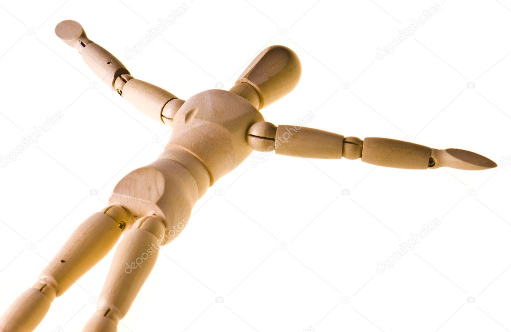 Wooden man lying on his back