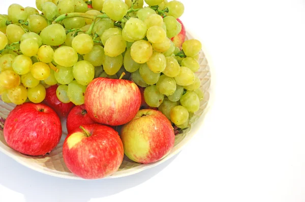 Stock image Grapes and apples on white background