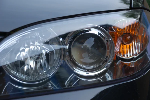 現代の車のヘッドライトの背景 — ストック写真