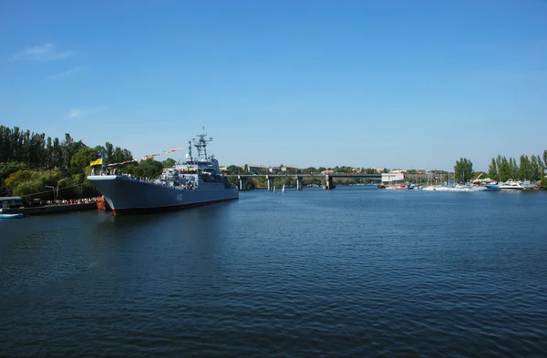 Military ship at city pier — Stock Photo, Image