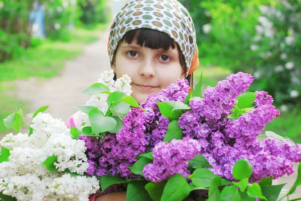 Child and flowers — Stock Photo, Image