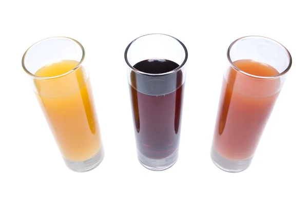 Три стакана с соком — стоковое фото