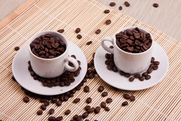 Cups with coffe grains — Stock Photo, Image