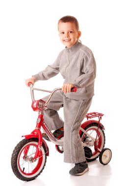 Boy on bicycle clipart