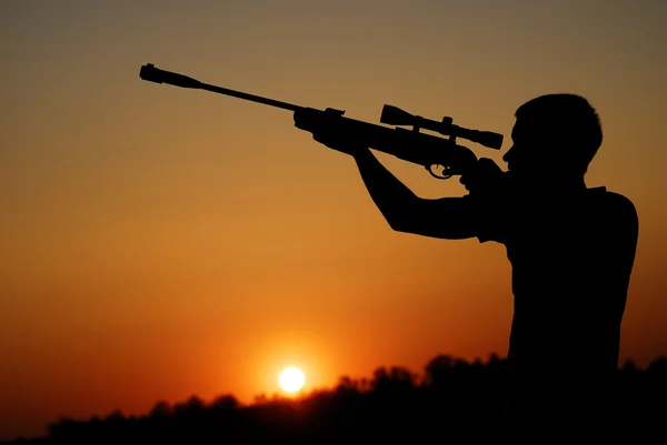 The sniper for a sunset. — Stock Photo, Image