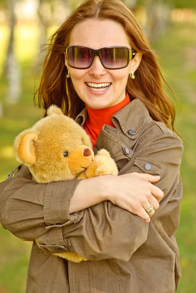 Girl with teddy bear — Stock Photo, Image