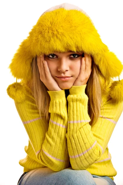 Portrait of blonde in yellow fur cap — Stock Photo, Image