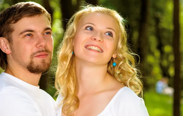 Portrait of man and woman in park. Stock Photo