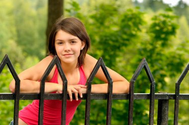 Girl at bridge hand-rail clipart