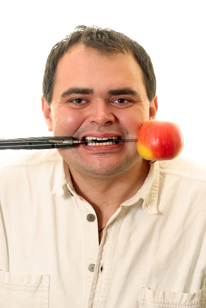 Чоловік з ножем і яблуком — стокове фото