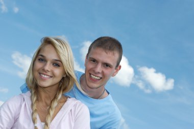 Young woman and young man laugh clipart