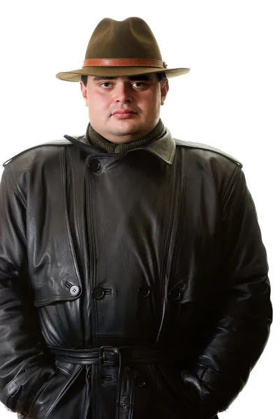Portrait of man in hat and raincoat — Stock Photo, Image