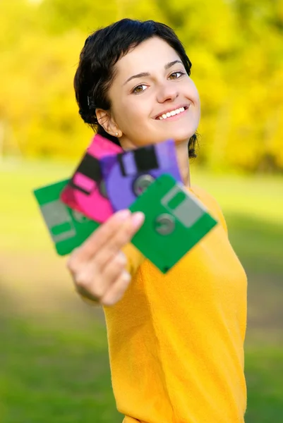 Girl with diskettes — Stock Photo, Image