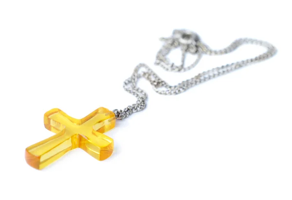 Croce di ambra con piccola catena — Foto Stock