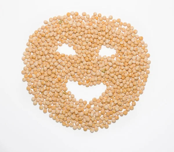 A person is with a smile from a pea — Stock Photo, Image