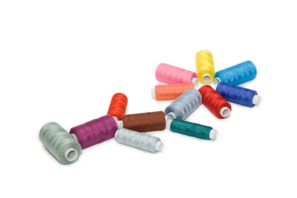 Different colored spools of thread — Stock Photo, Image