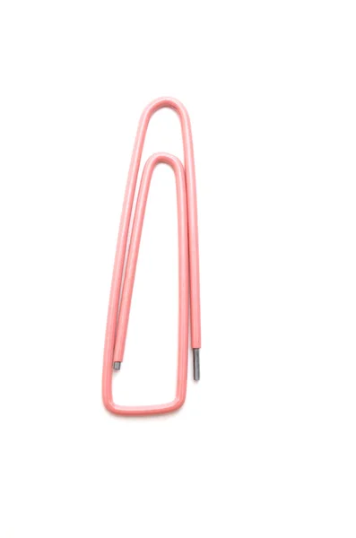 Pink old paper clip isolated on white — Stock Photo, Image