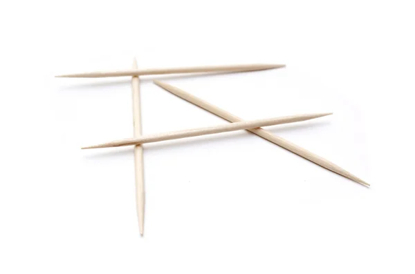 Few toothpicks on white background — Stock Photo, Image