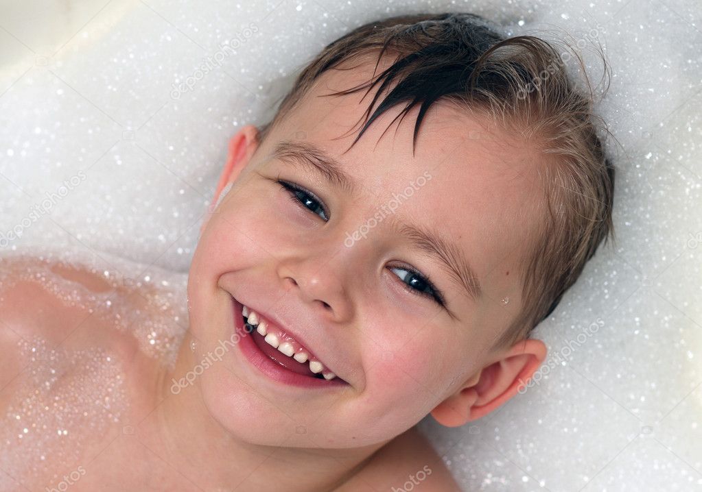 Smiling boy in the bathtub — Stock Photo © Justaman 2479292