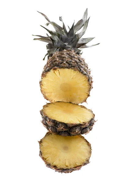 Cutting pineapple on white — Stock Photo, Image