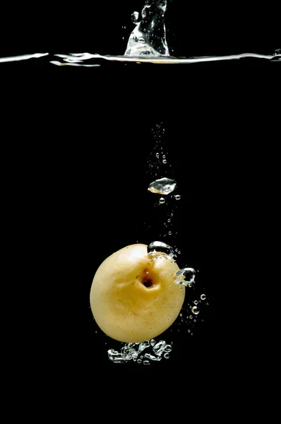 Apricot in water — Stock Photo, Image