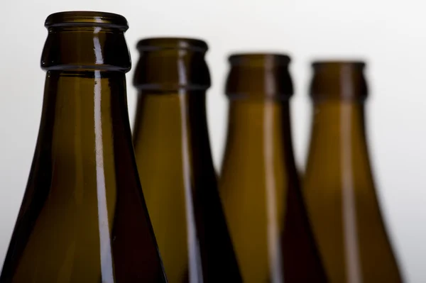 Beer bottle on grey macro — Stock Photo, Image