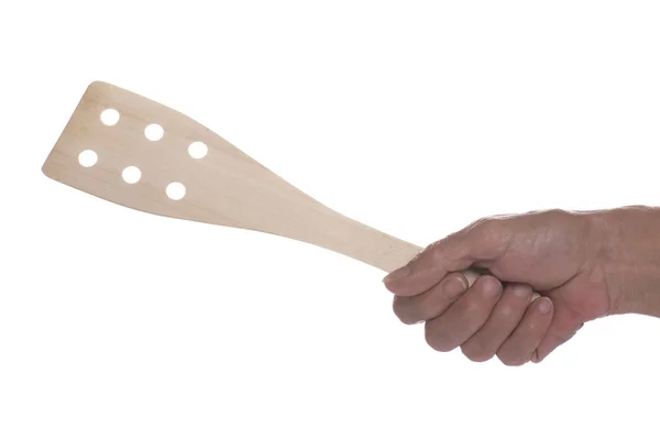 白手中的木 spatule — 图库照片