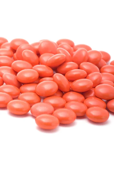 Comprimidos vermelhos fechar — Fotografia de Stock