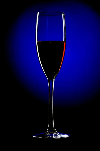 Champagne glasses on blue background — Stock Photo, Image