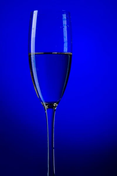 Champagne glasses on blue — Stock Photo, Image