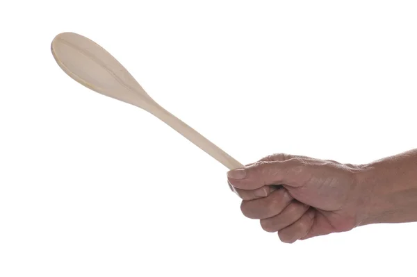 Wood spoon in hand — Stock Photo, Image