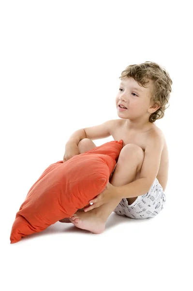 Мальчик с подушкой — стоковое фото