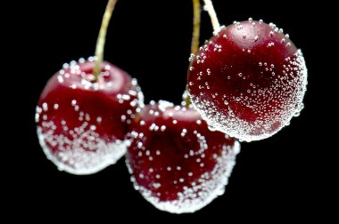 Cherries in water close up clipart