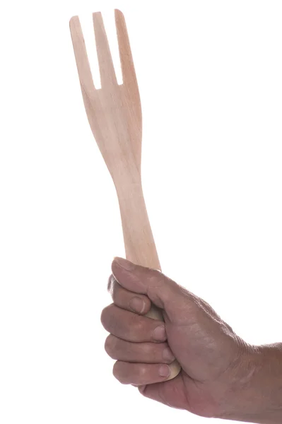 Vidlička dřevo v ruce na bílém pozadí — Stock fotografie