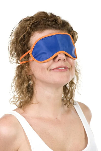 Chica en la máscara para dormir en blanco — Foto de Stock