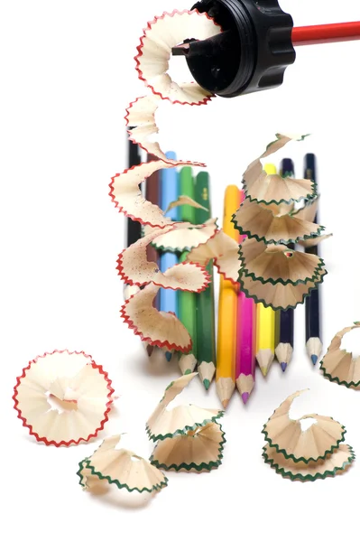 Pencil and shavings on white background — Stock Photo, Image
