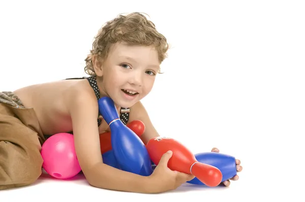 Little boy play toy skittles — Stock Photo, Image