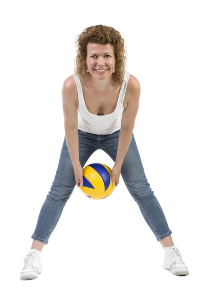 Жінка з кольоровим м'ячем на білому — стокове фото