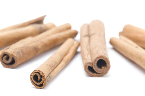Cinnamon on white close up — Stock Photo, Image