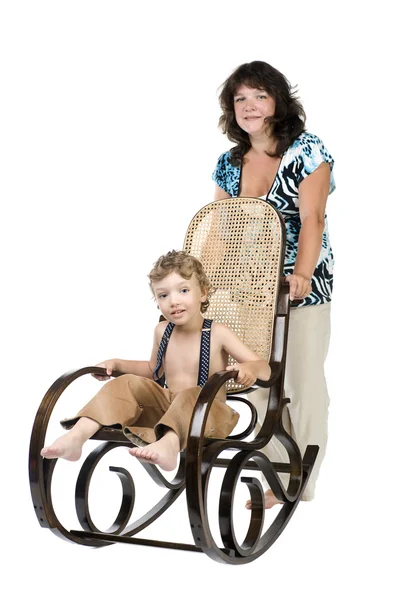 Familie met schommelstoel — Stockfoto